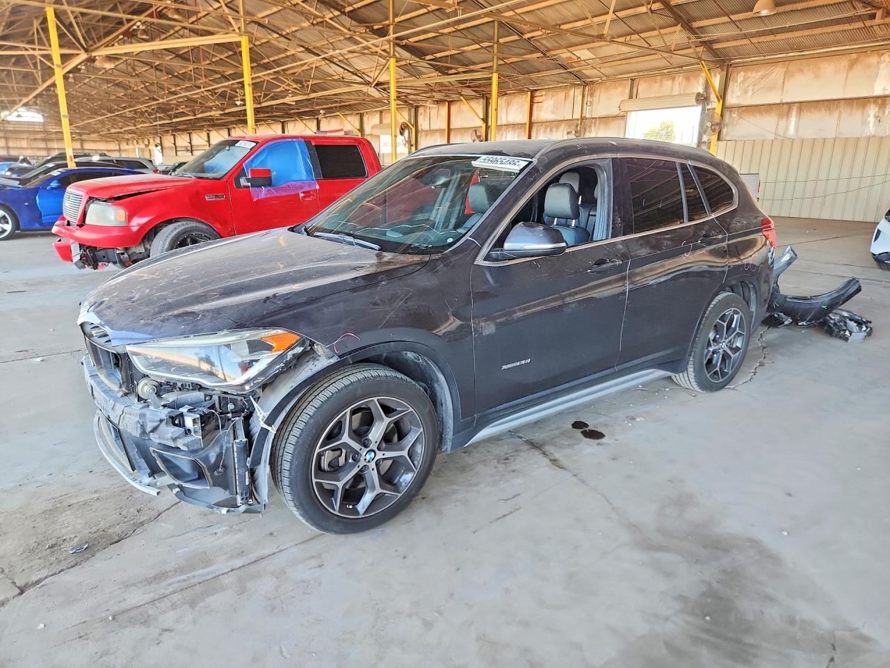 2017 BMW X1 xDrive28i, VIN WBXHT3Z36H4A65129 — Front end