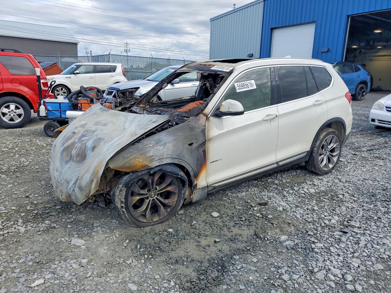2017 BMW X3 xDrive28i, VIN 5UXWX9C51H0T02229 — Engine fire