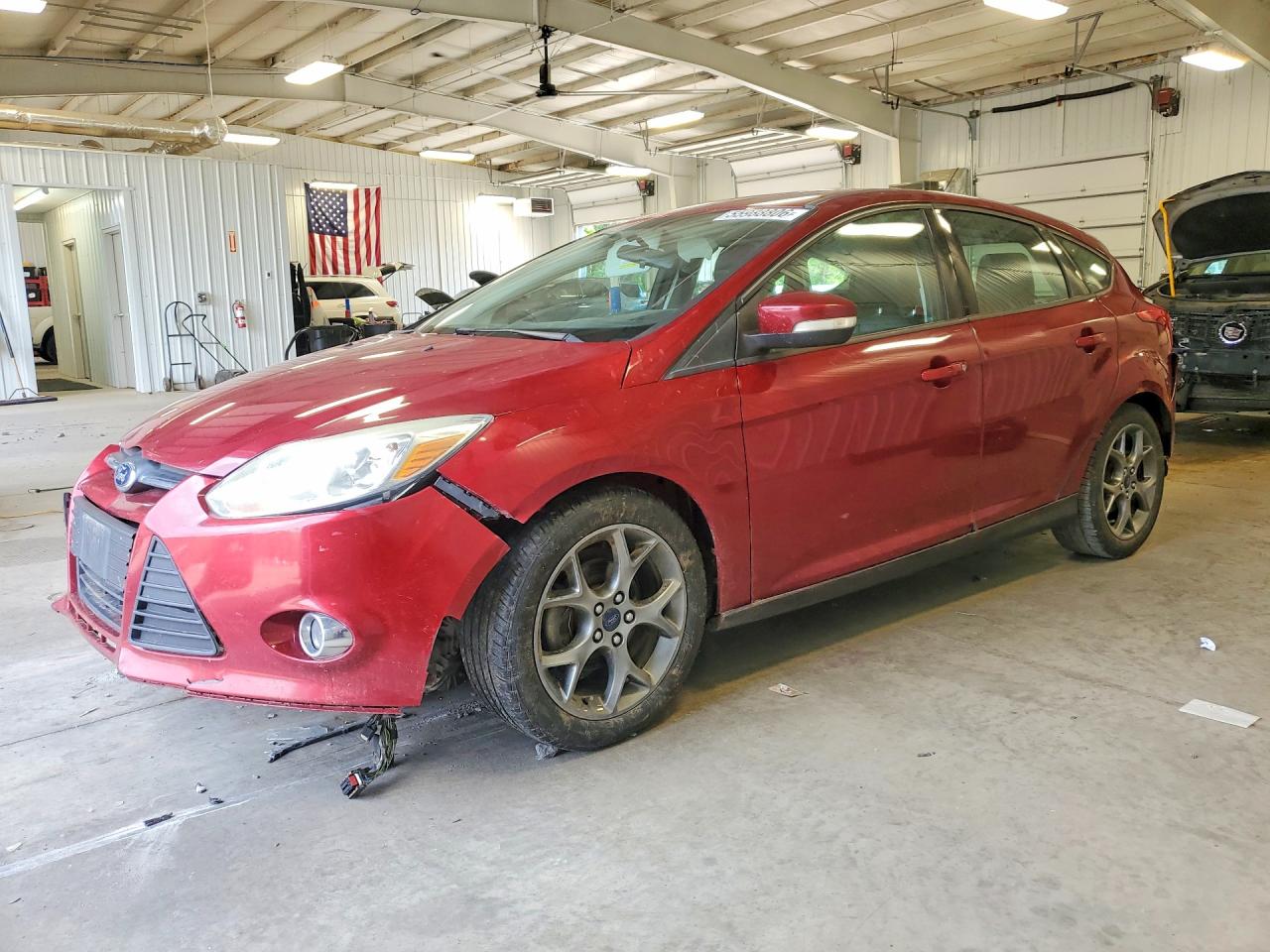 2013 Ford Focus SE, VIN 1FADP3K28DL231865 — Undercarriage