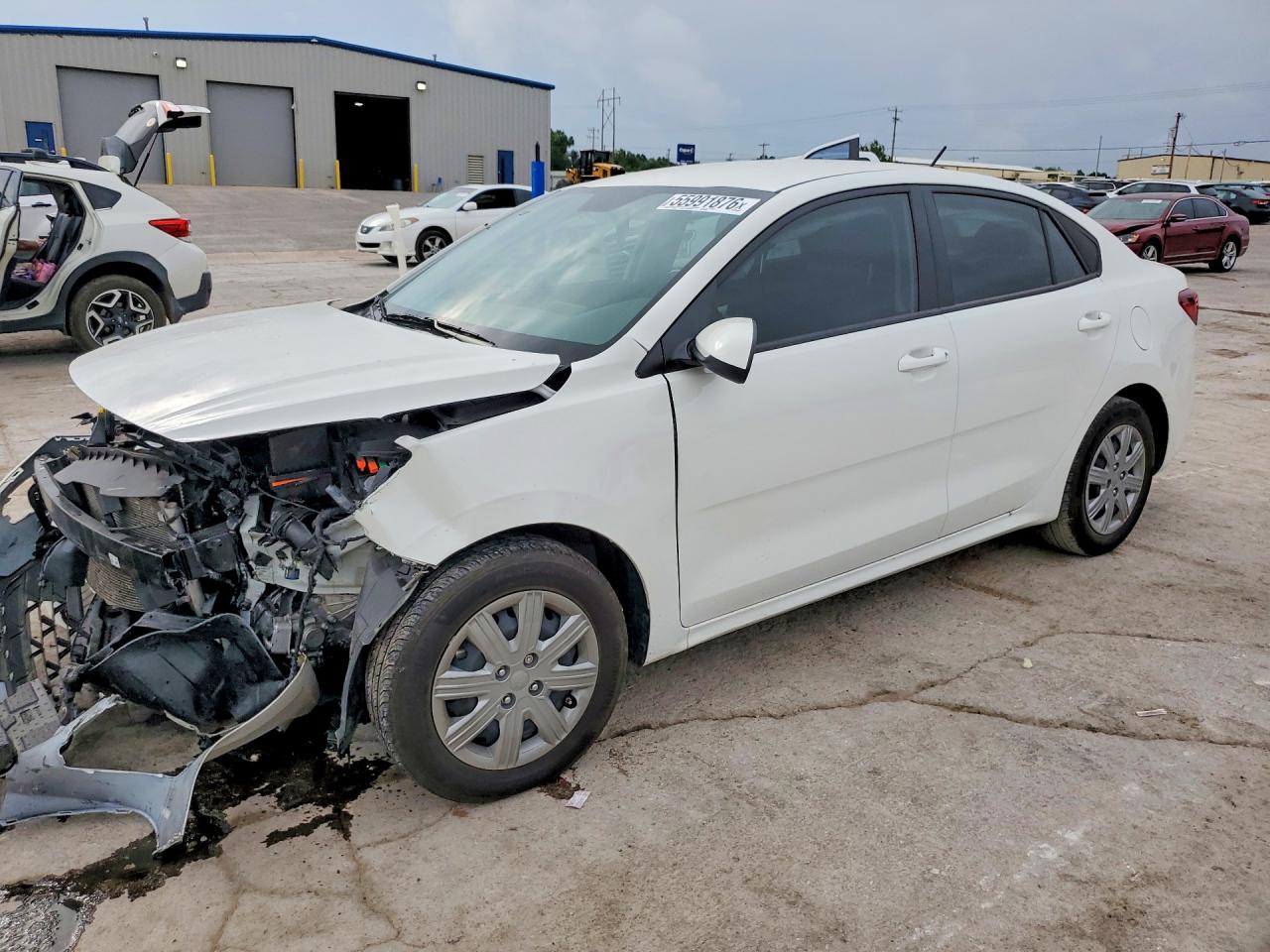 2023 Kia Rio S, VIN 3KPA24AD4PE604949 — Front end