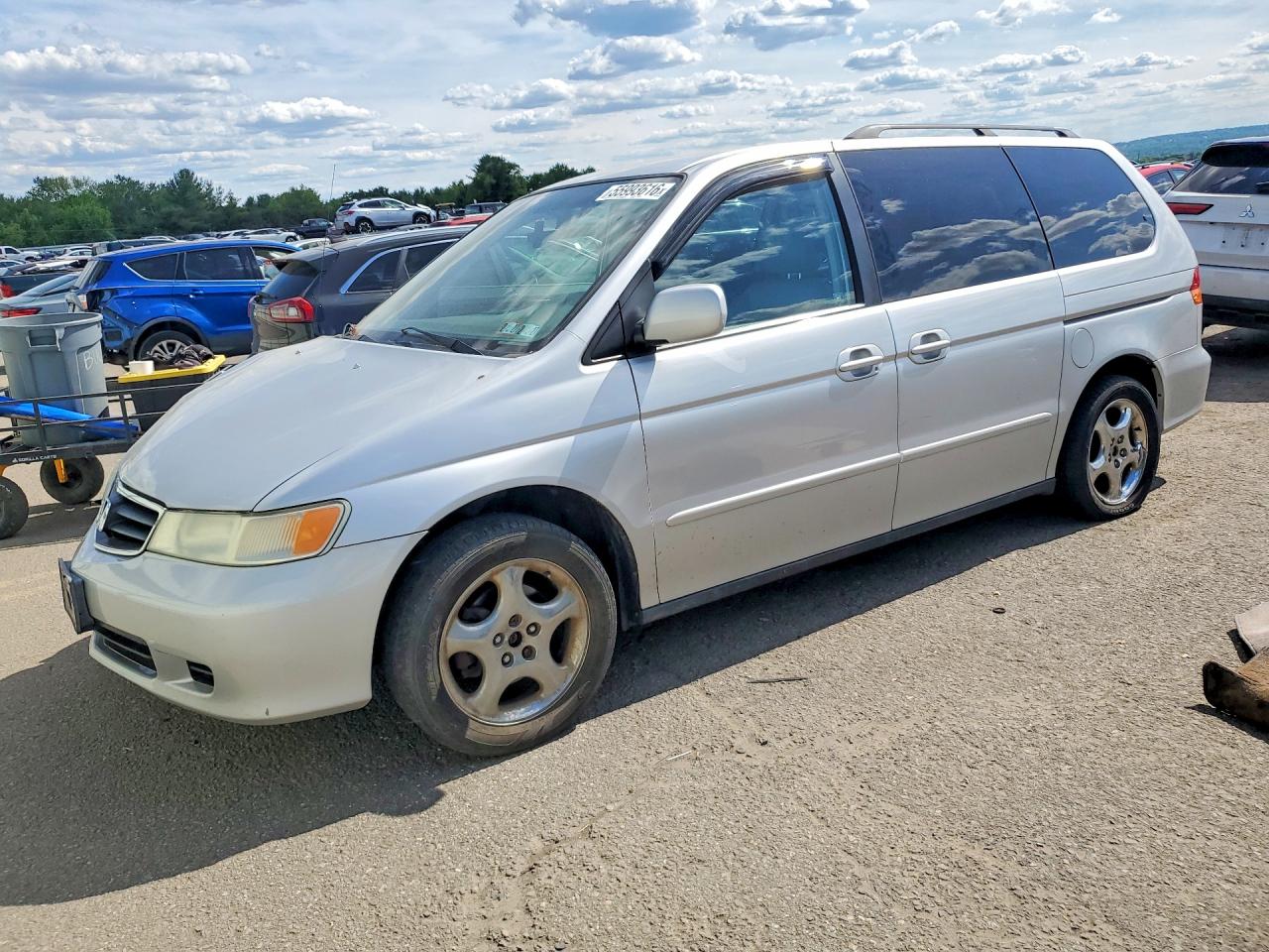 2003 Honda Odyssey EX-L, VIN 5FNRL18723B144774 — Front end