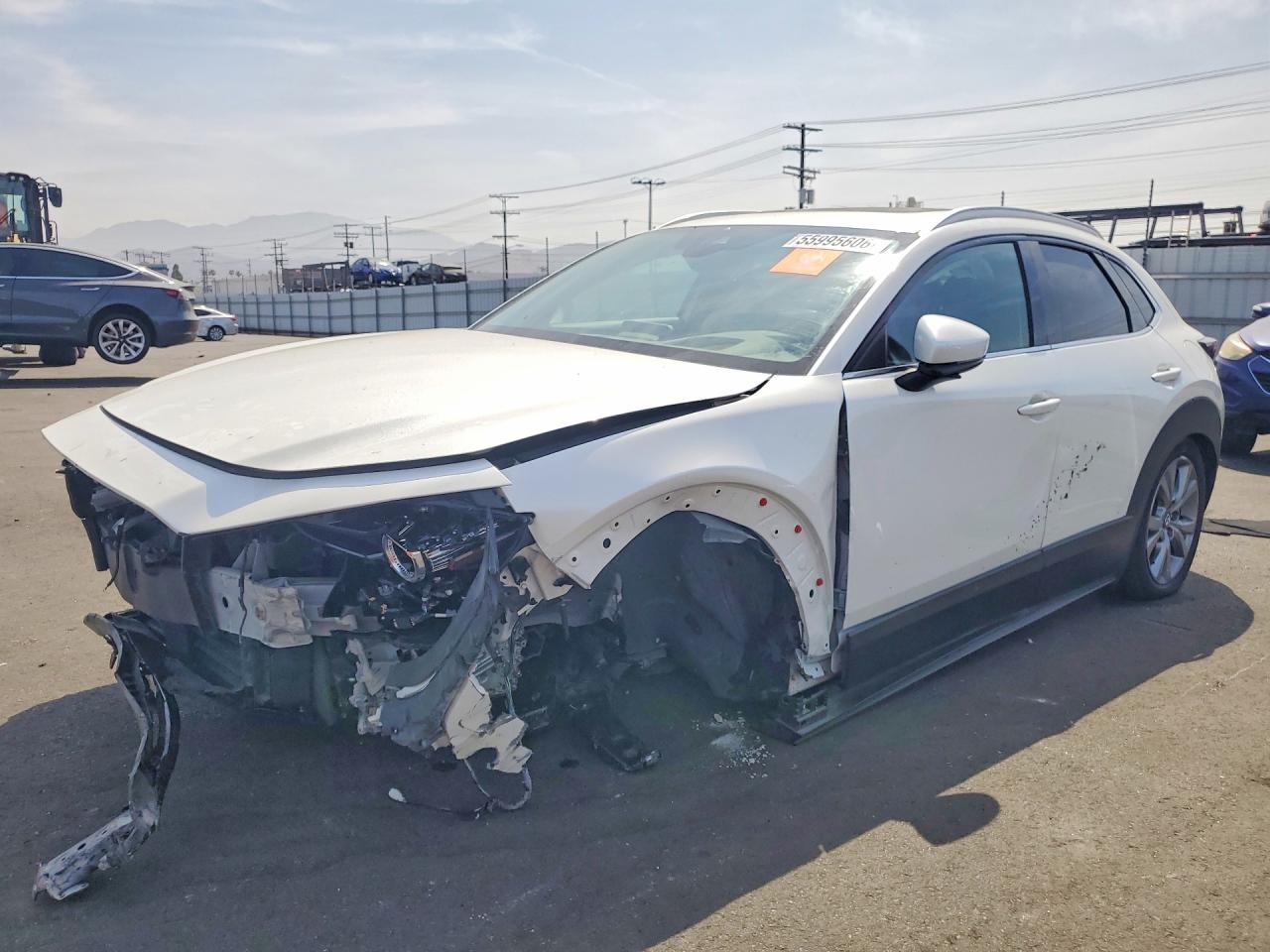2023 Mazda CX-30 S Premium, VIN 3MVDMBDM8PM513727 — Front end