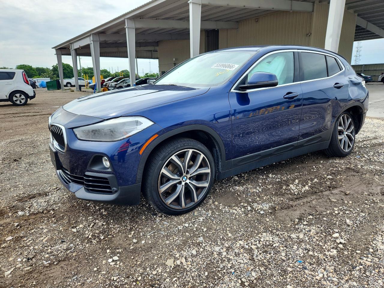 2020 BMW X2 sDrive28i, VIN WBXYH9C02L5P54880 — Бок