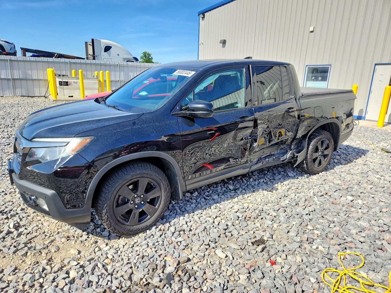 2019 Honda Ridgeline Black Edition, VIN 5FPYK3F80KB040165 — Side