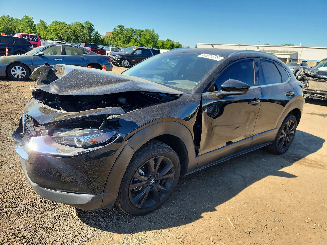 2023 Mazda CX-30 Premium Plus, VIN 3MVDMBEY1PM567243 — Front end