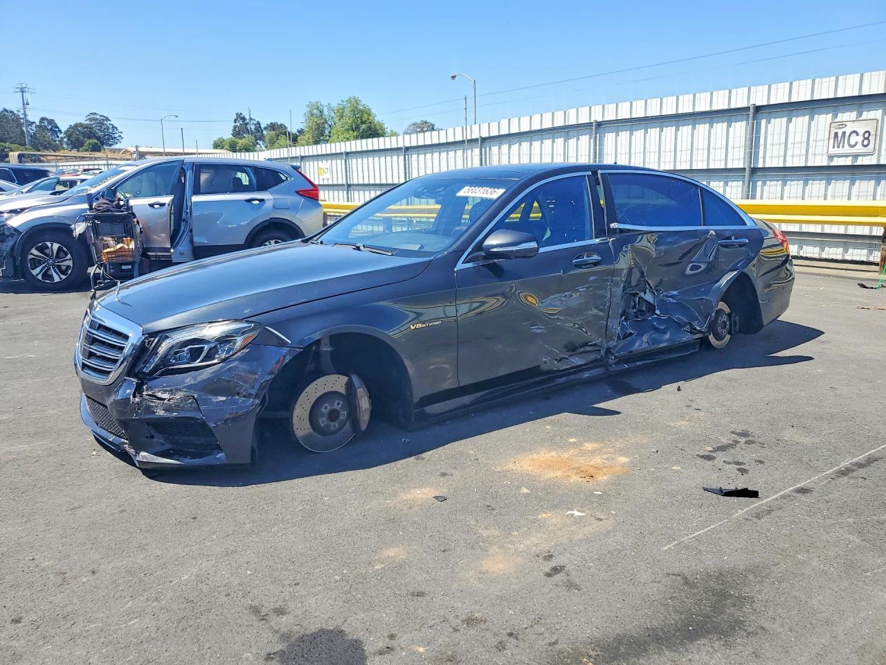 2015 Mercedes-Benz S 550, VIN WDDUG8CB2FA156655 — Side