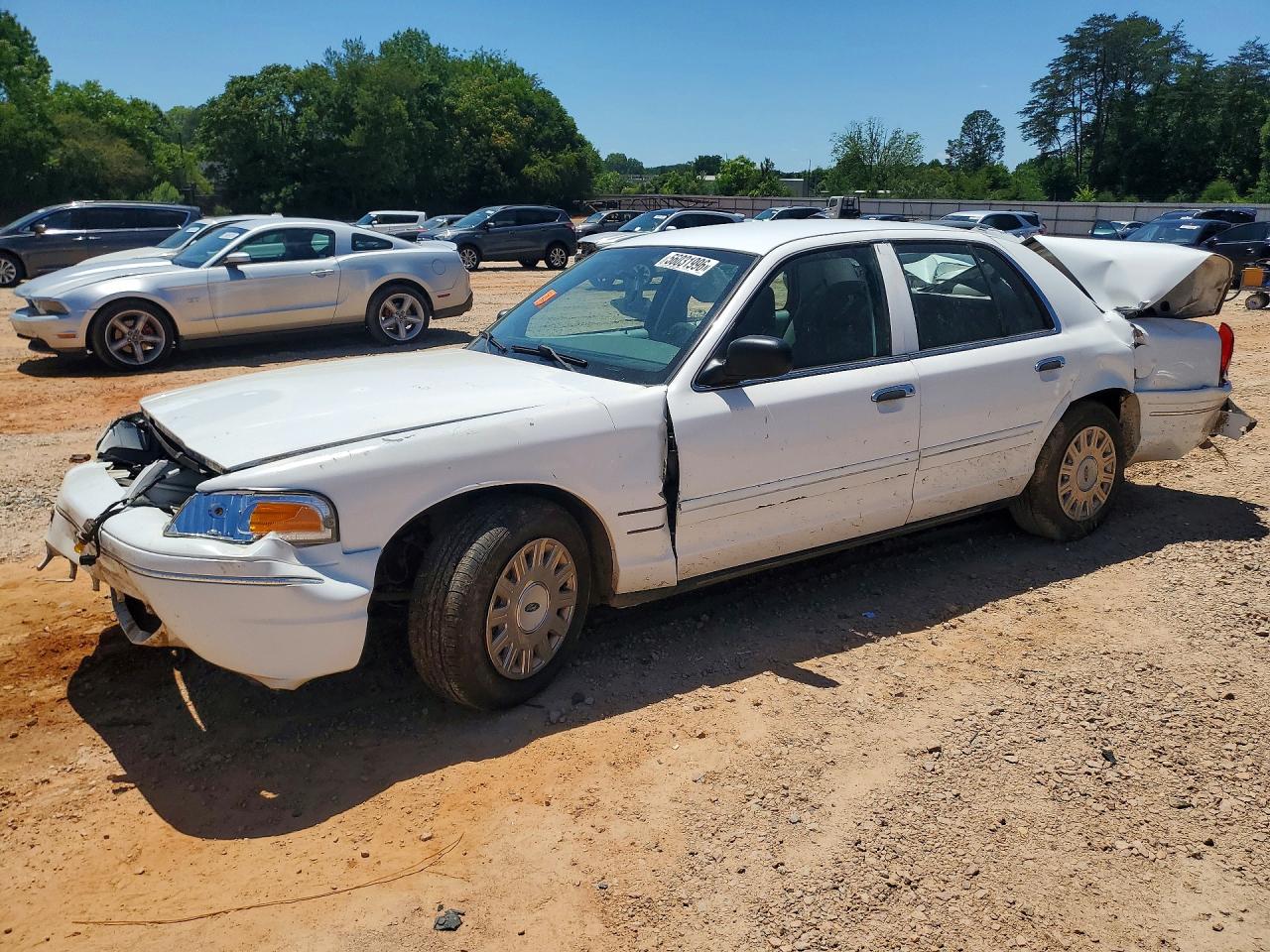 2005 Ford Police Interceptor, VIN 2FAFP71W25X158405 — All over