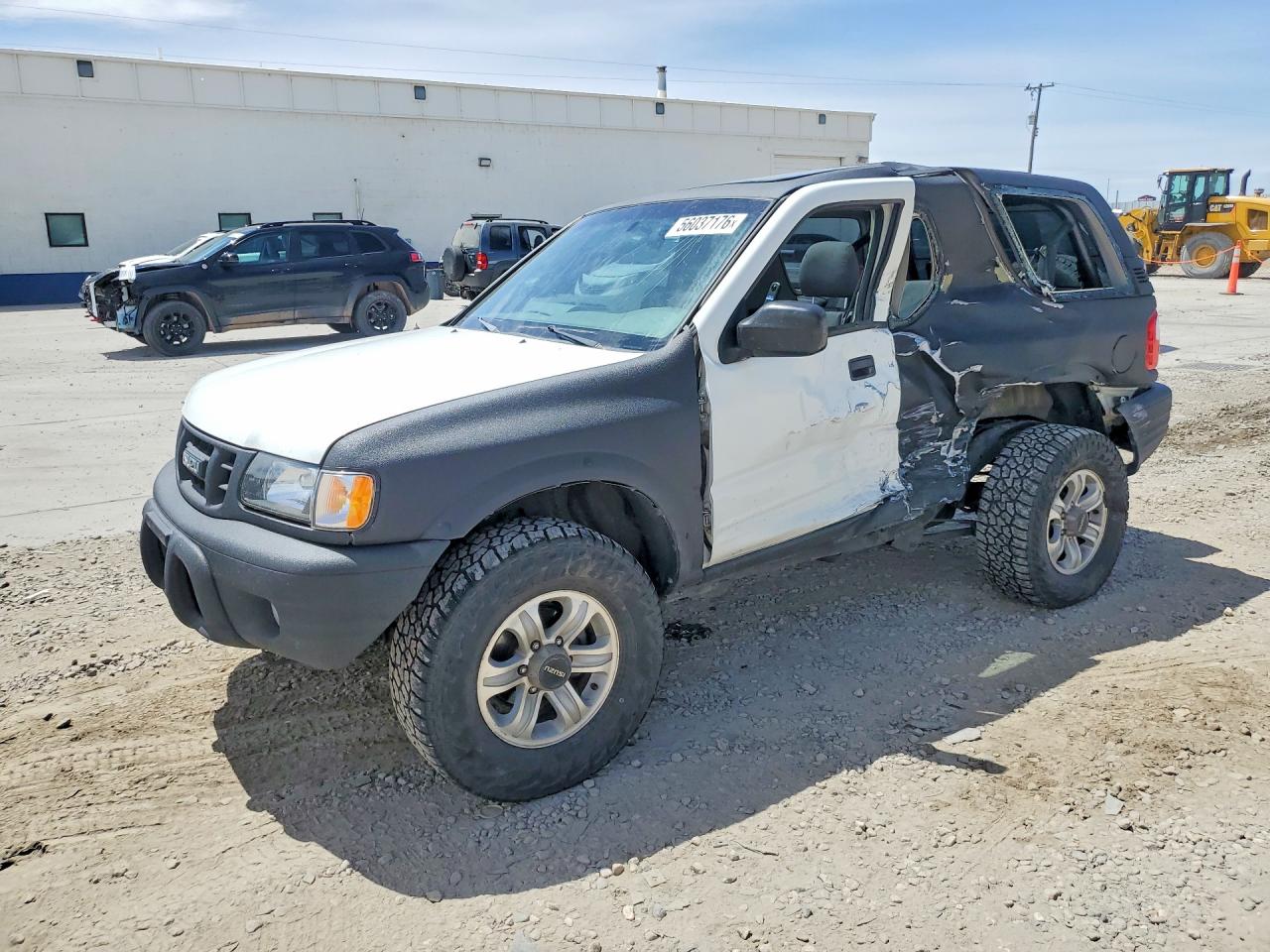 2001 Isuzu Rodeo, VIN 4S2CM57W014306106 — Side