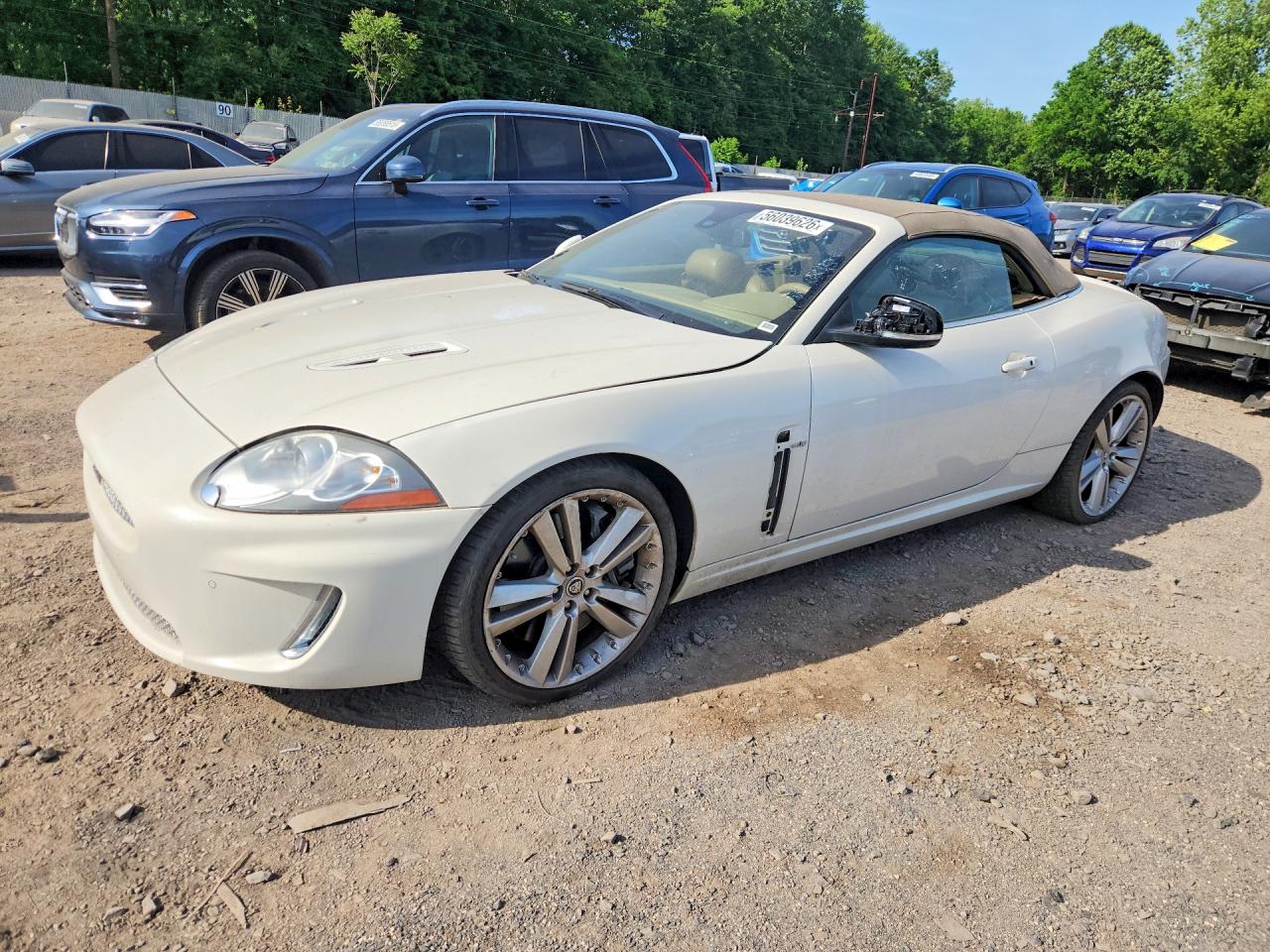 2010 Jaguar XK XKR, VIN SAJWA4EC5AMB33997 — Side