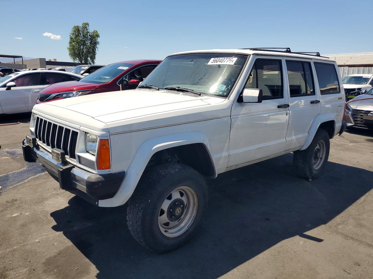 1990 Jeep Cherokee, VIN 1J4FJ78L1LL180066 — Minor dents and scratches