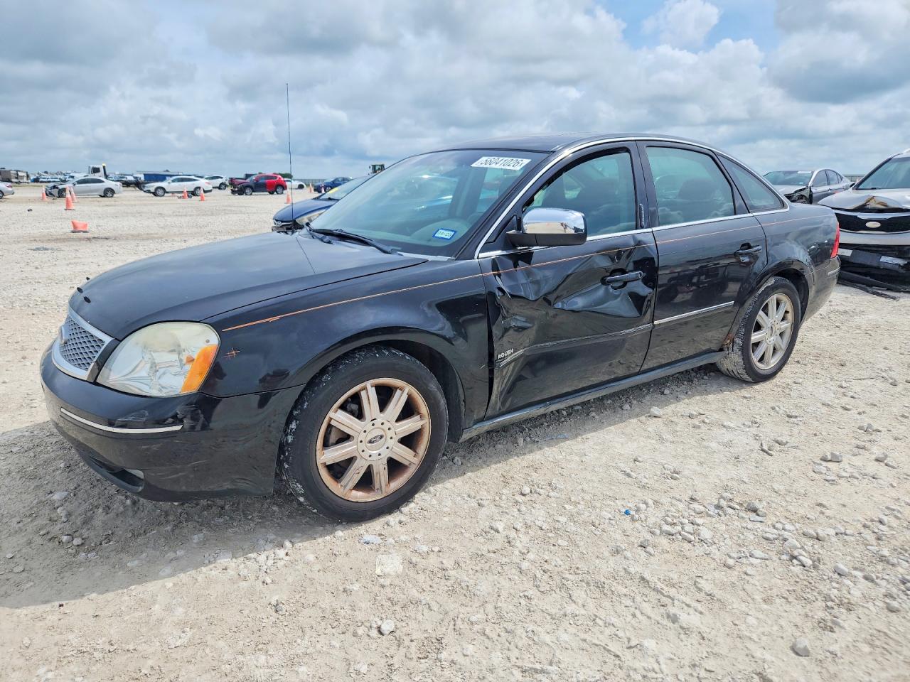 2006 Ford Five Hundred Limited, VIN 1FAFP25136G105947 — Side