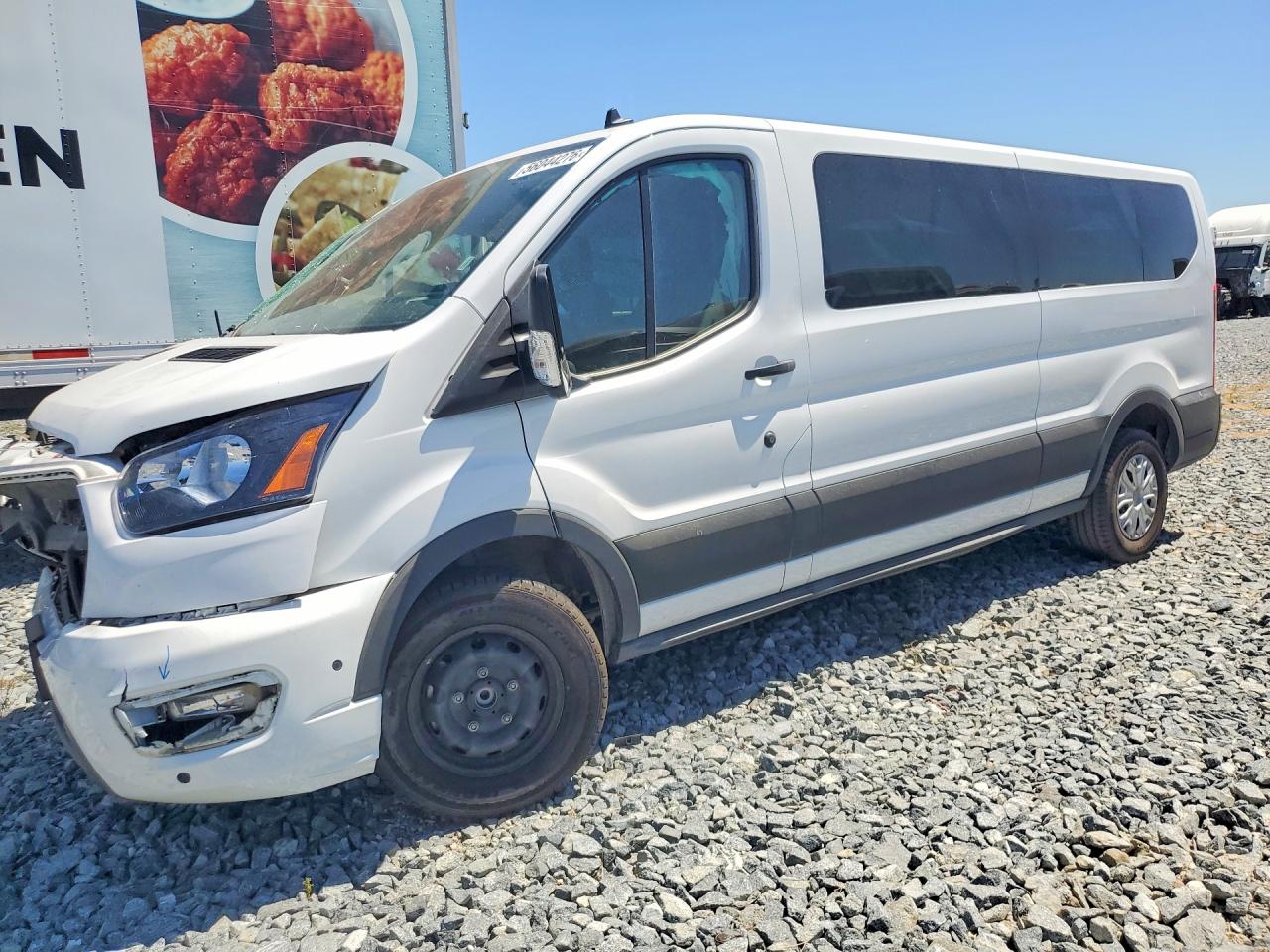 2025 Ford Transit Passenger XLT, VIN 1FDAX2Y89SKA39730 — Front end