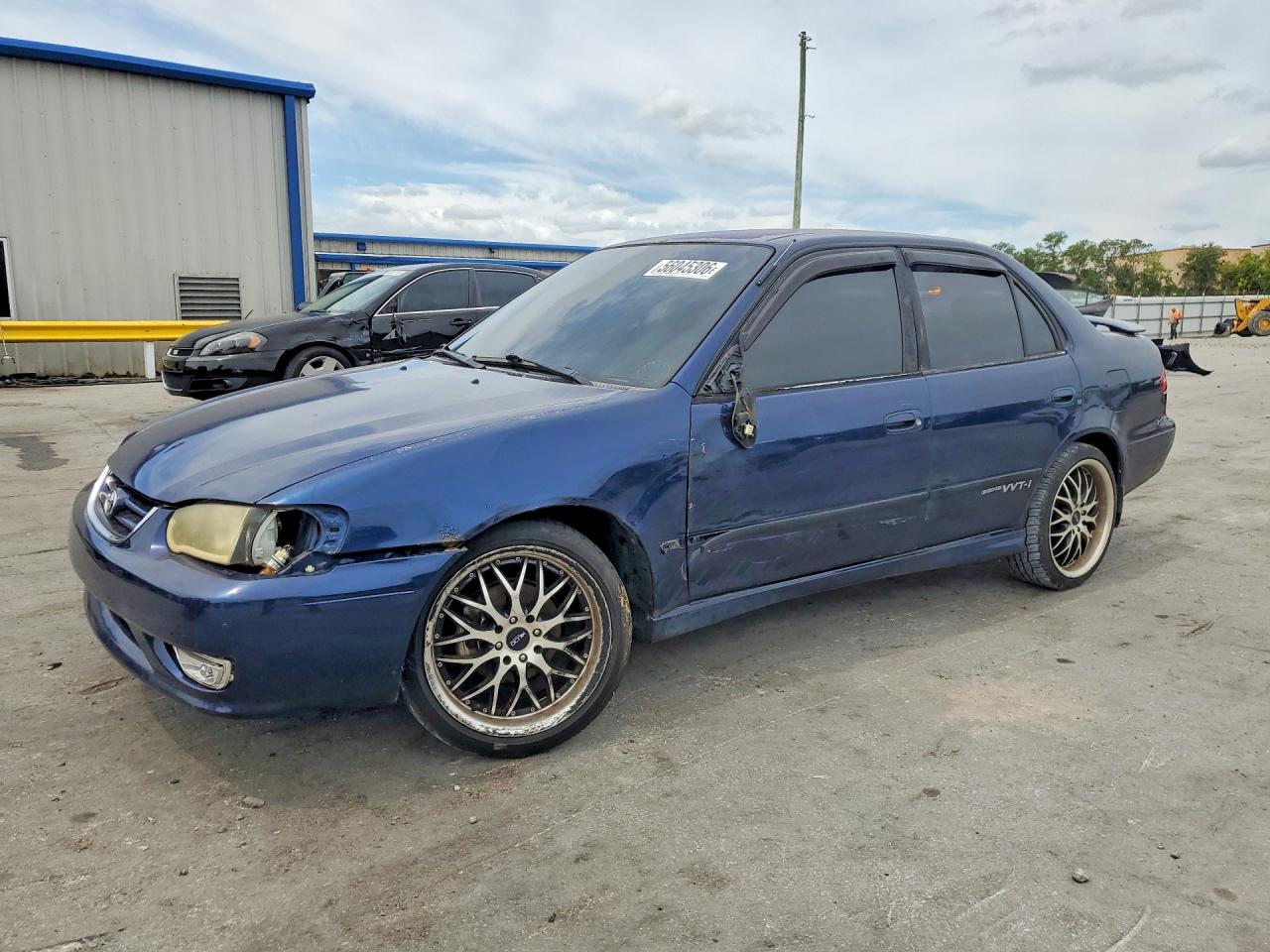 2001 Toyota Corolla LE, VIN 2T1BR12E91C448080 — Side