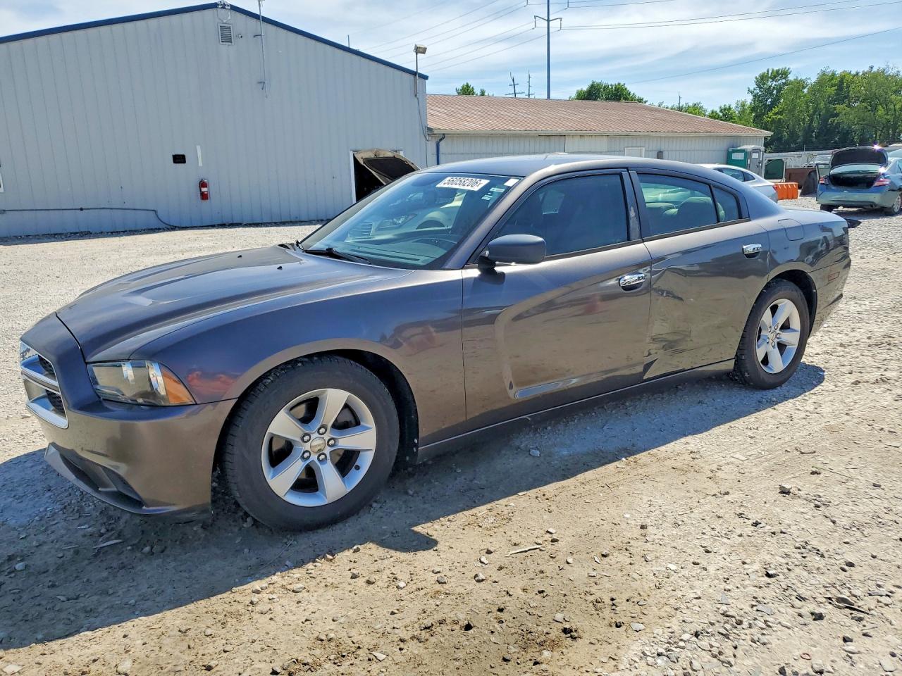 2013 Dodge Charger SE, VIN 2C3CDXBG5DH637136 — Side