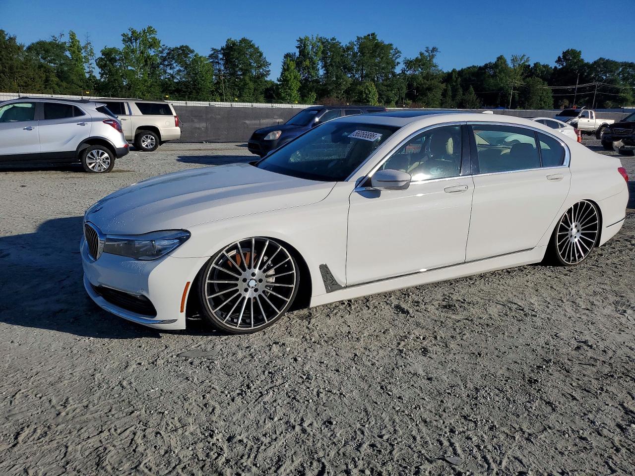2016 BMW 7 Series 740i, VIN WBA7E2C57GGD99896 — Minor dents and scratches