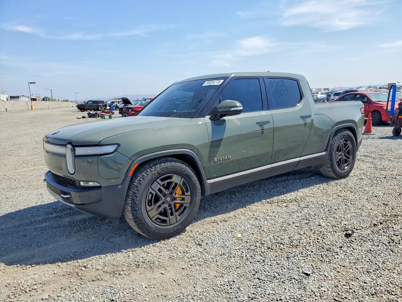 2022 Rivian R1T Launch Edition, VIN 7FCTGAAL3NN003129 — Side