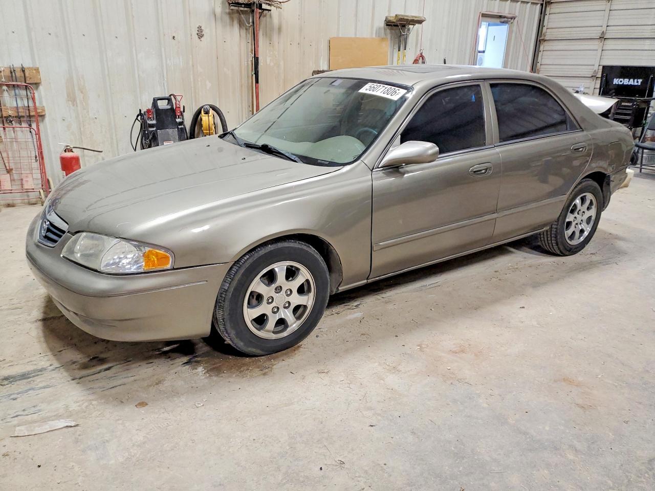 2000 Mazda 626 LX, VIN 1YVGF22C0Y5105162 — Rear end