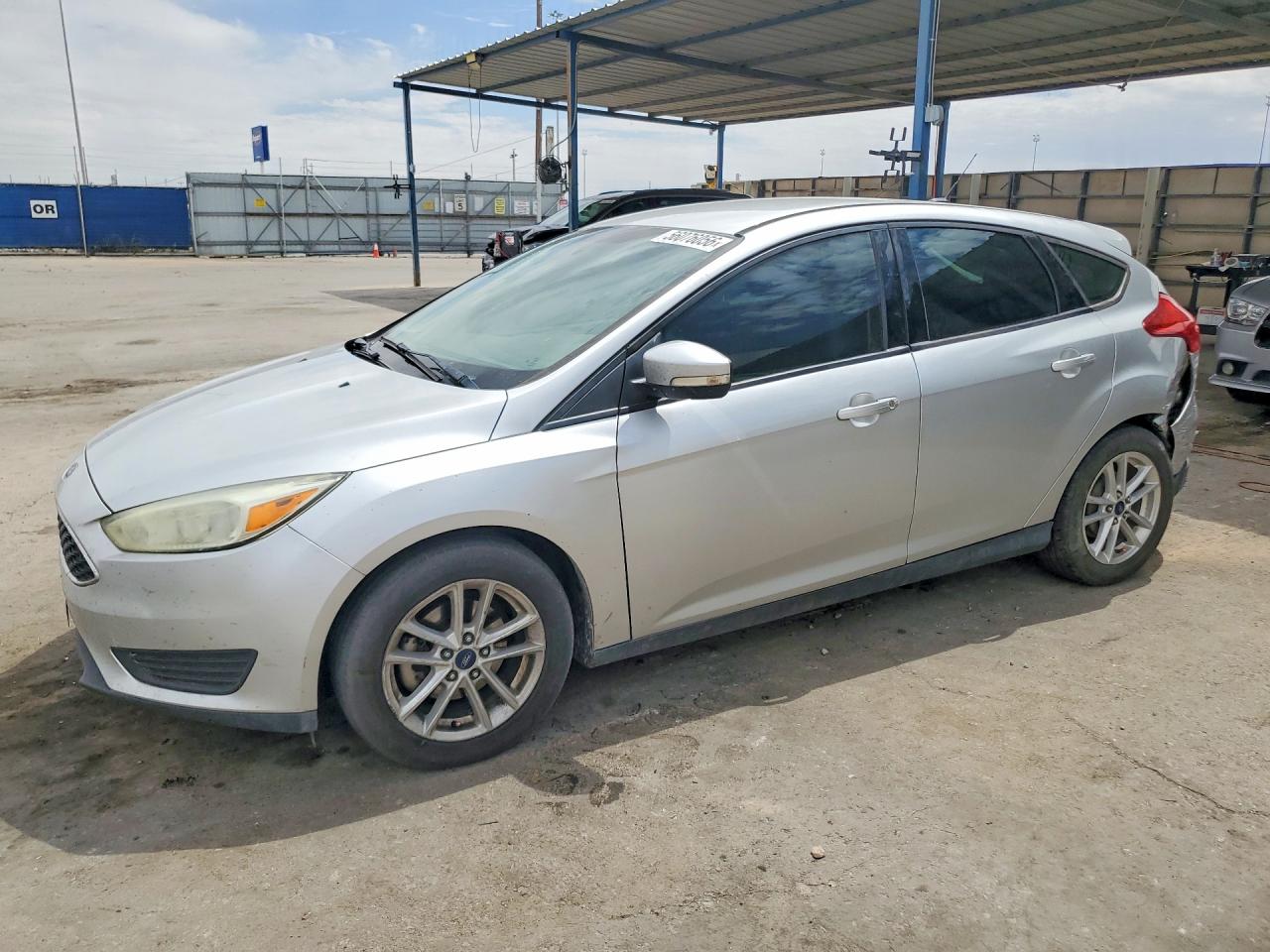 2016 Ford Focus SE, VIN 1FADP3K27GL328933 — Hail