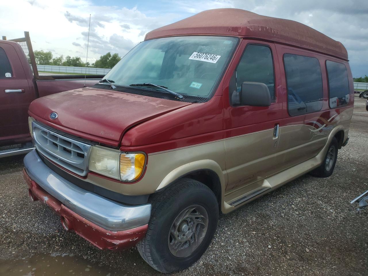 1999 Ford Econoline Cargo, VIN 1FDPE24L8XHA50555 — Normal wear