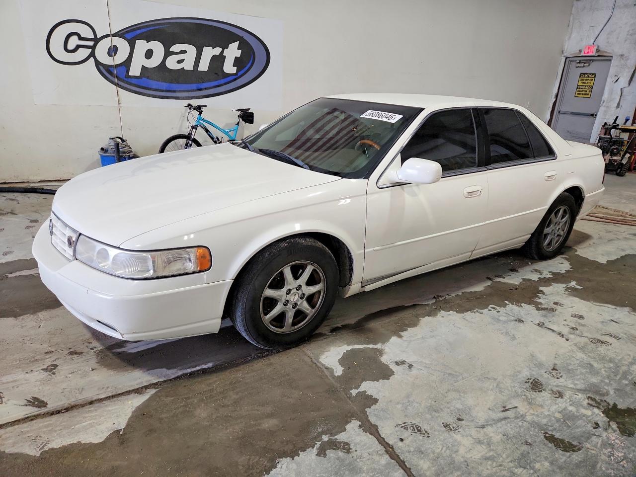1999 Cadillac Seville Touring STS, VIN 1G6KY5498XU941225 — Minor dents and scratches