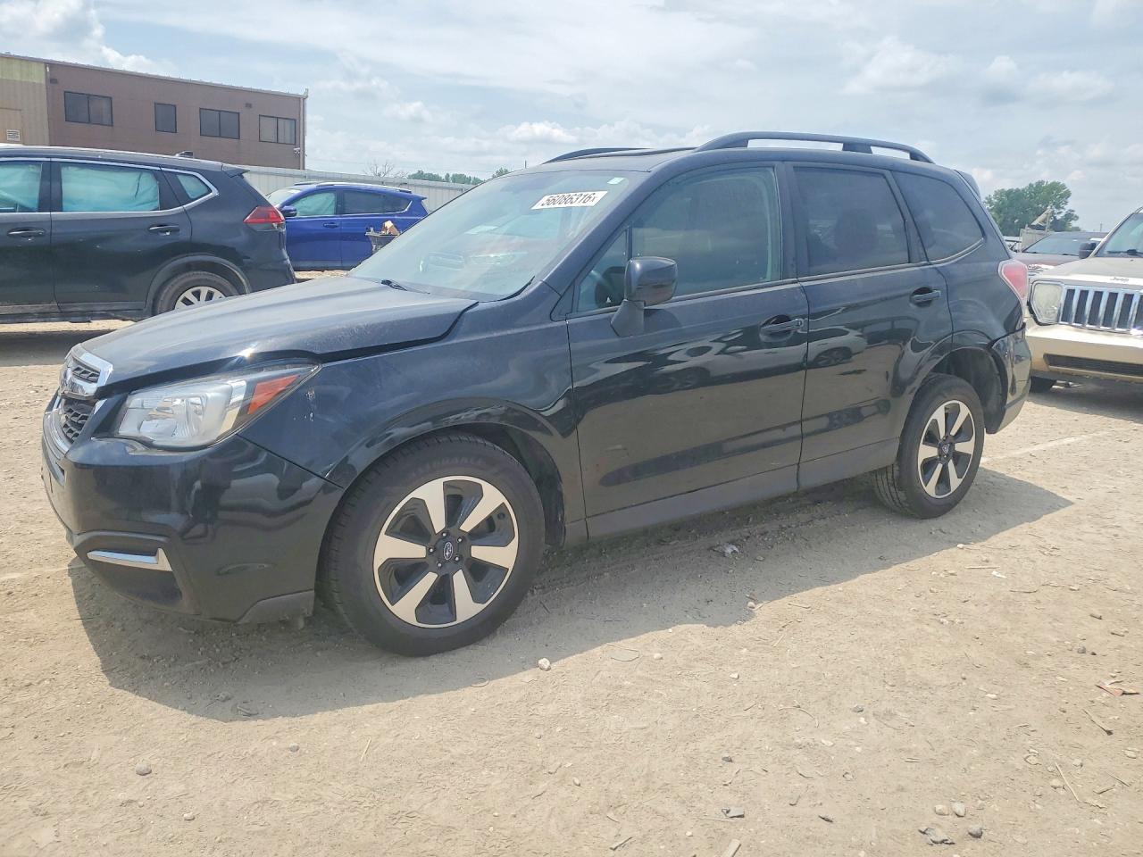 2018 Subaru Forester Premium, VIN JF2SJAEC8JH564143 — Side