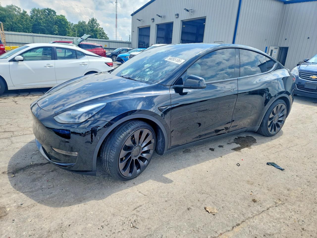 2023 Tesla Model Y Performance, VIN 7SAYGDEF7PF892359 — Град
