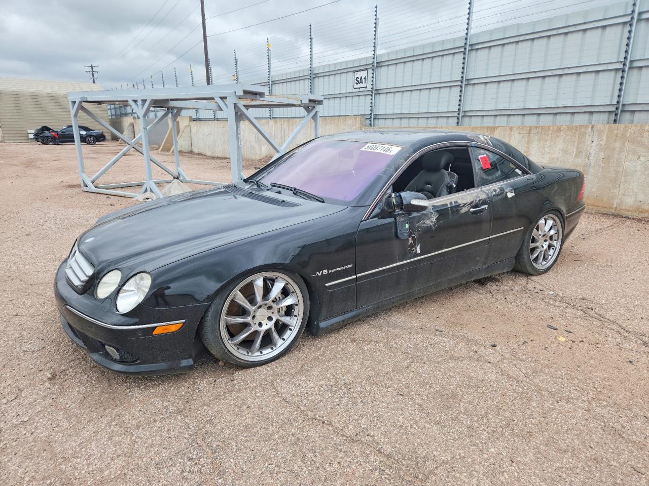 2003 Mercedes-Benz CL 5.5L AMG, VIN WDBPJ74J83A035664 — Side