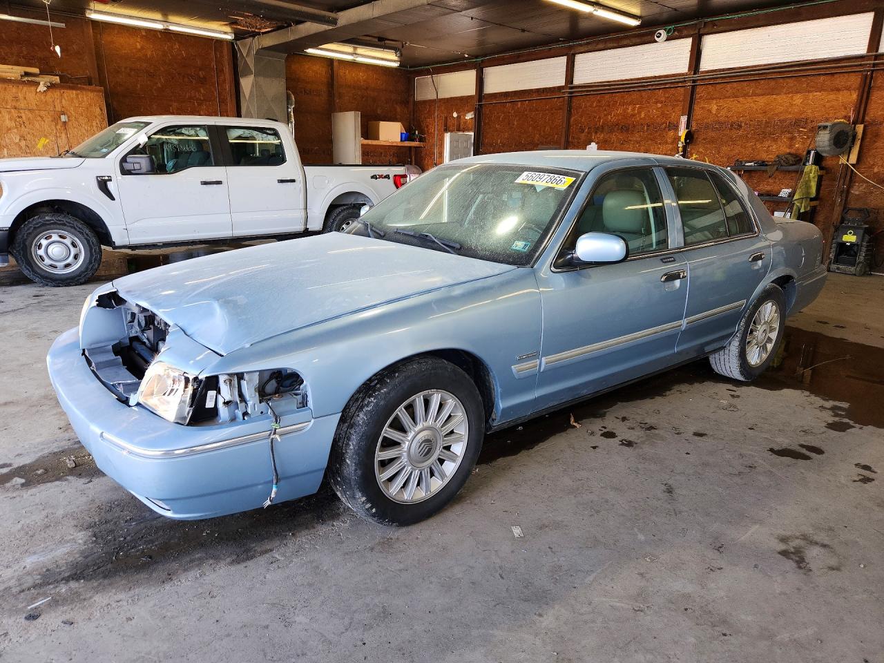2011 Mercury Grand Marquis LS, VIN 2MEBM7FV6BX600114 — Front end