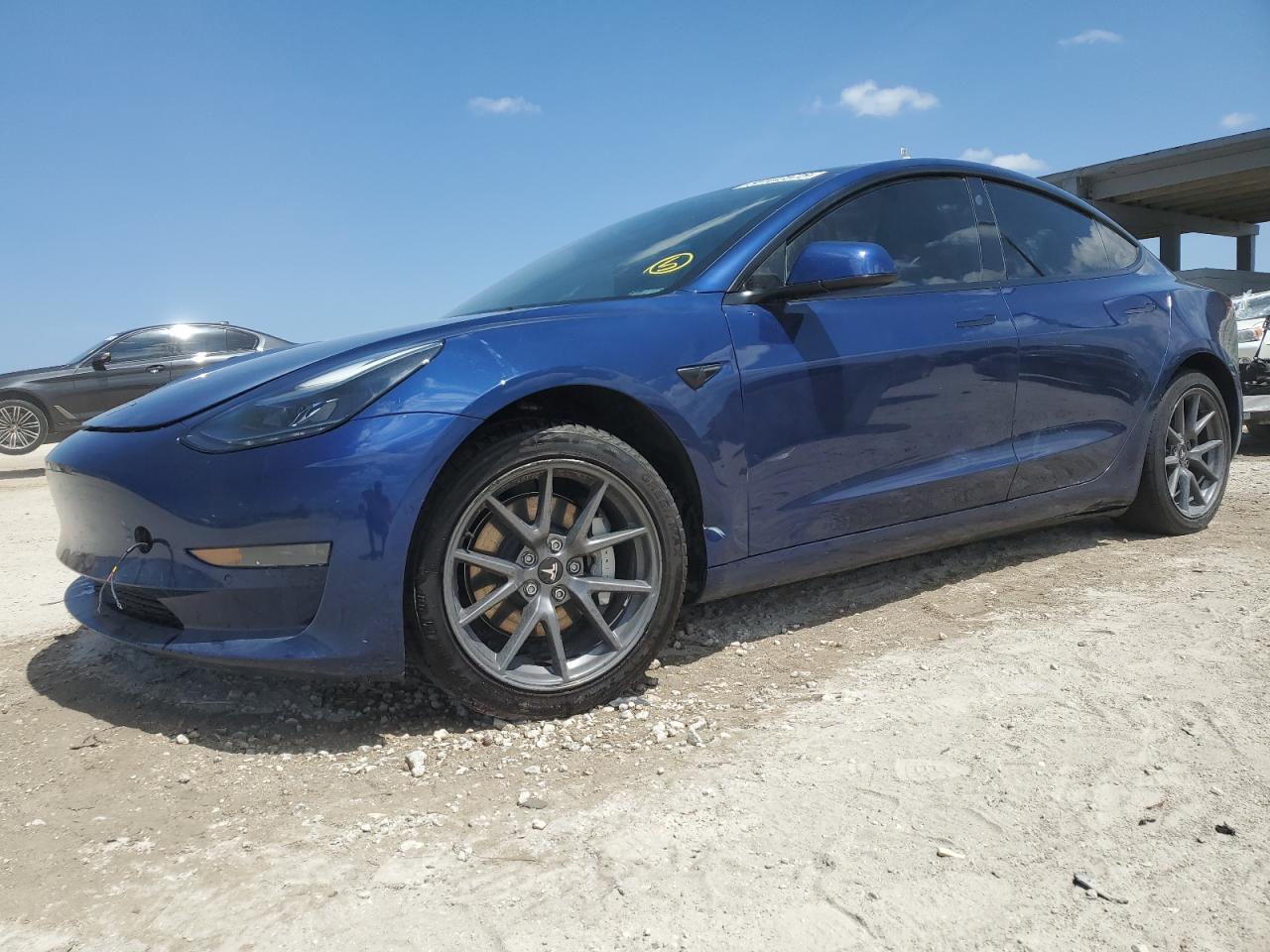 2022 Tesla Model 3, VIN 5YJ3E1EAXNF188721 — Engine fire