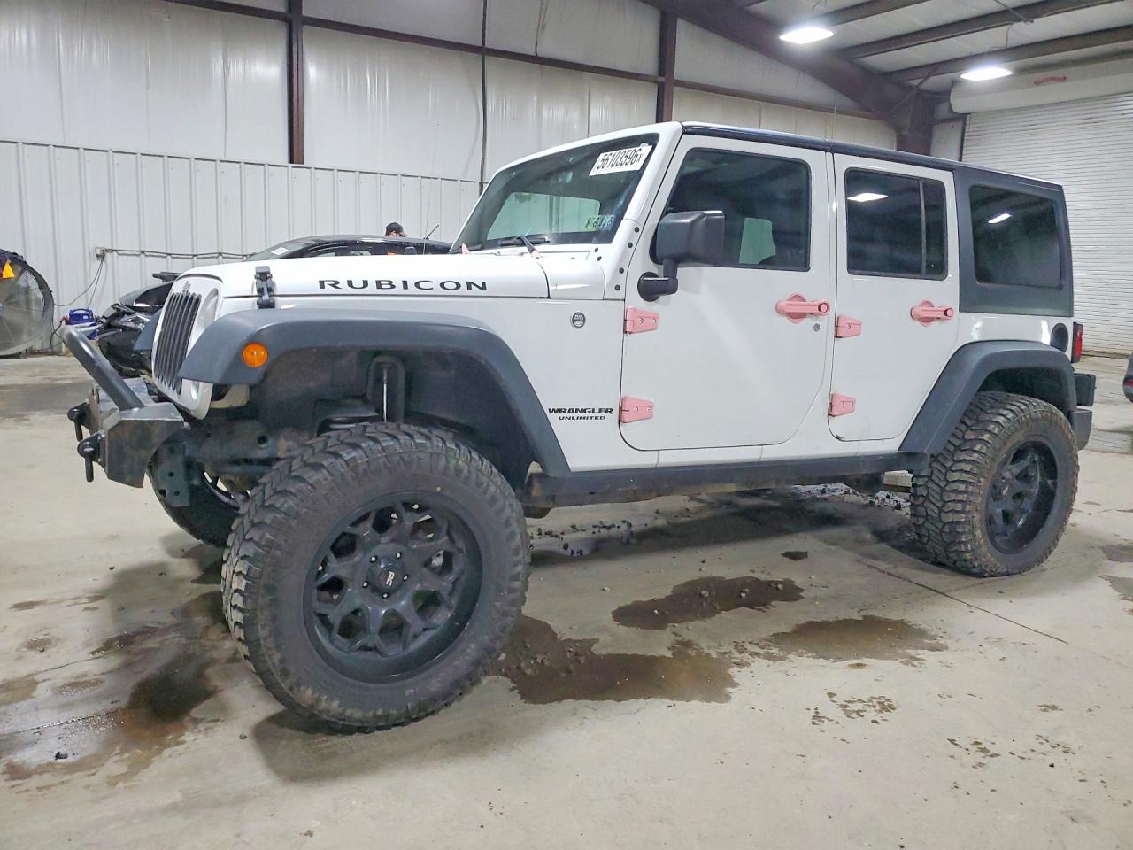 2016 Jeep Wrangler Unlimited Rubicon Hard Rock, VIN 1C4BJWFG8GL191642 — Зад