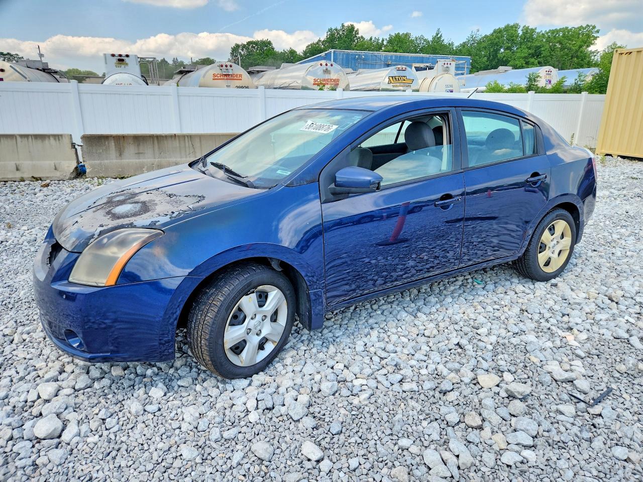 2009 Nissan Sentra S FE+, VIN 3N1AB61E59L660842 — Engine fire