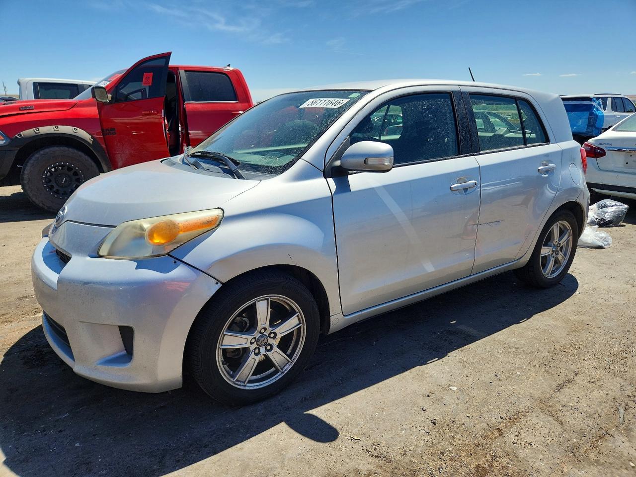 2010 Scion xD, VIN JTKKU4B44AJ054362 — Side