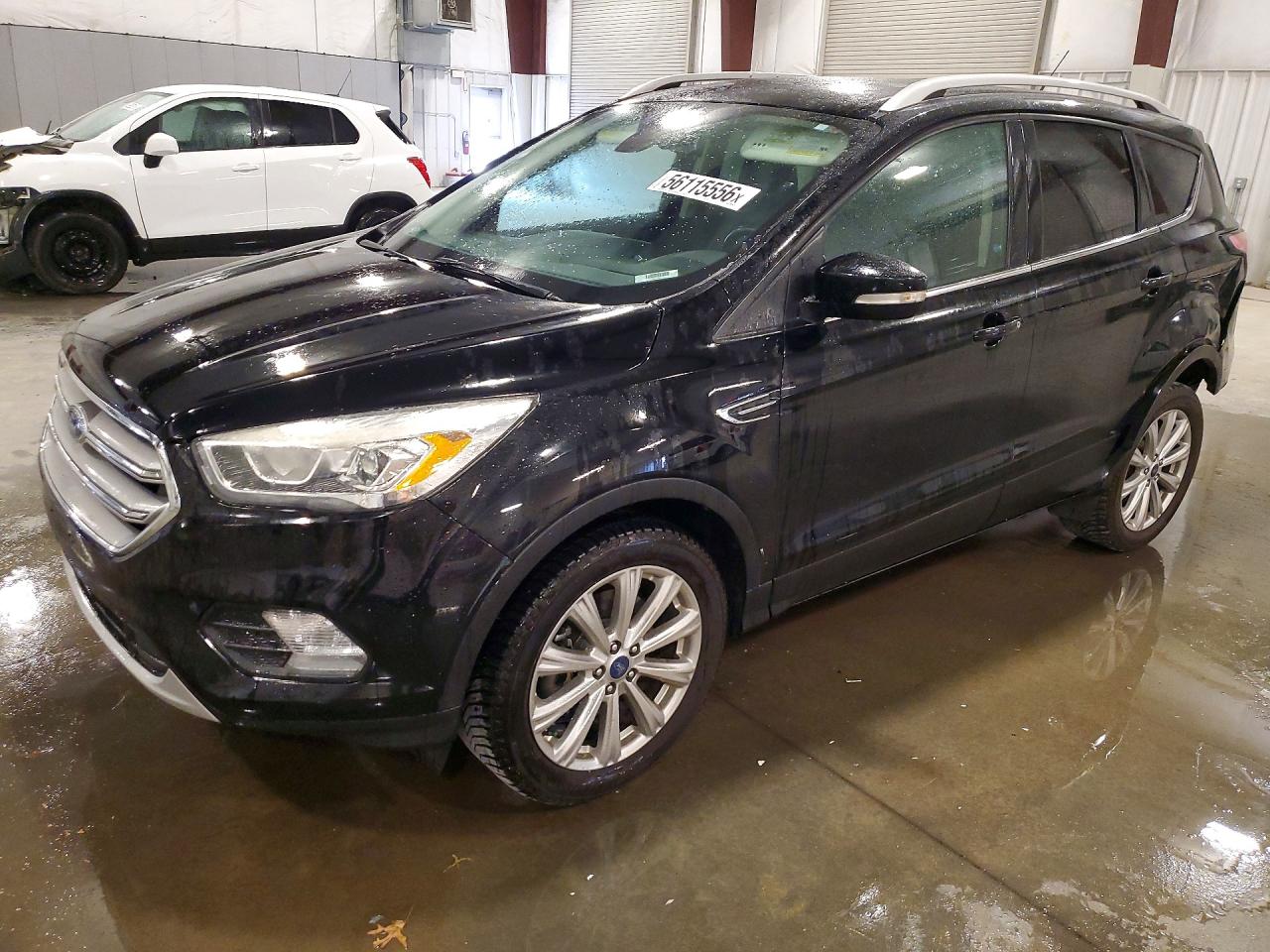 2017 Ford Escape Titanium, VIN 1FMCU9JD9HUE00131 — Rear end