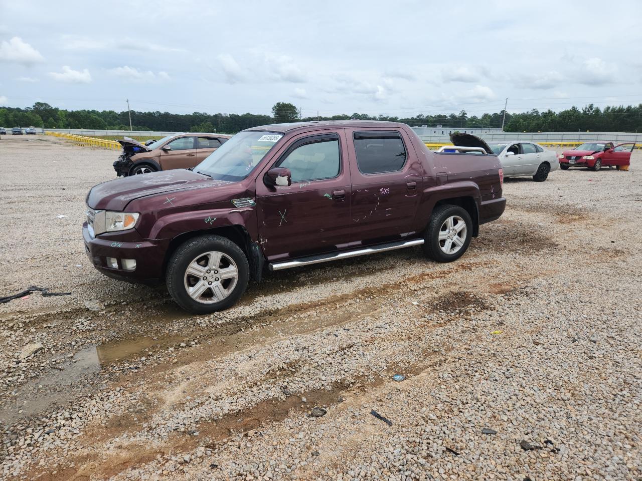 2010 Honda Ridgeline RTL, VIN 5FPYK1F56AB003887 — Front end