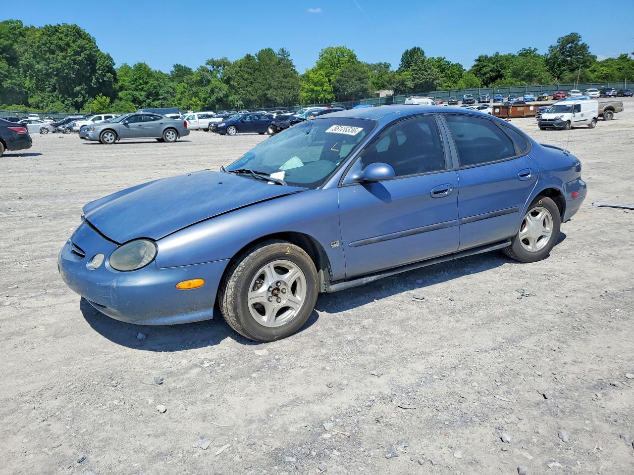 1999 Ford Taurus SE, VIN 1FAFP53S9XG151801 — Front end