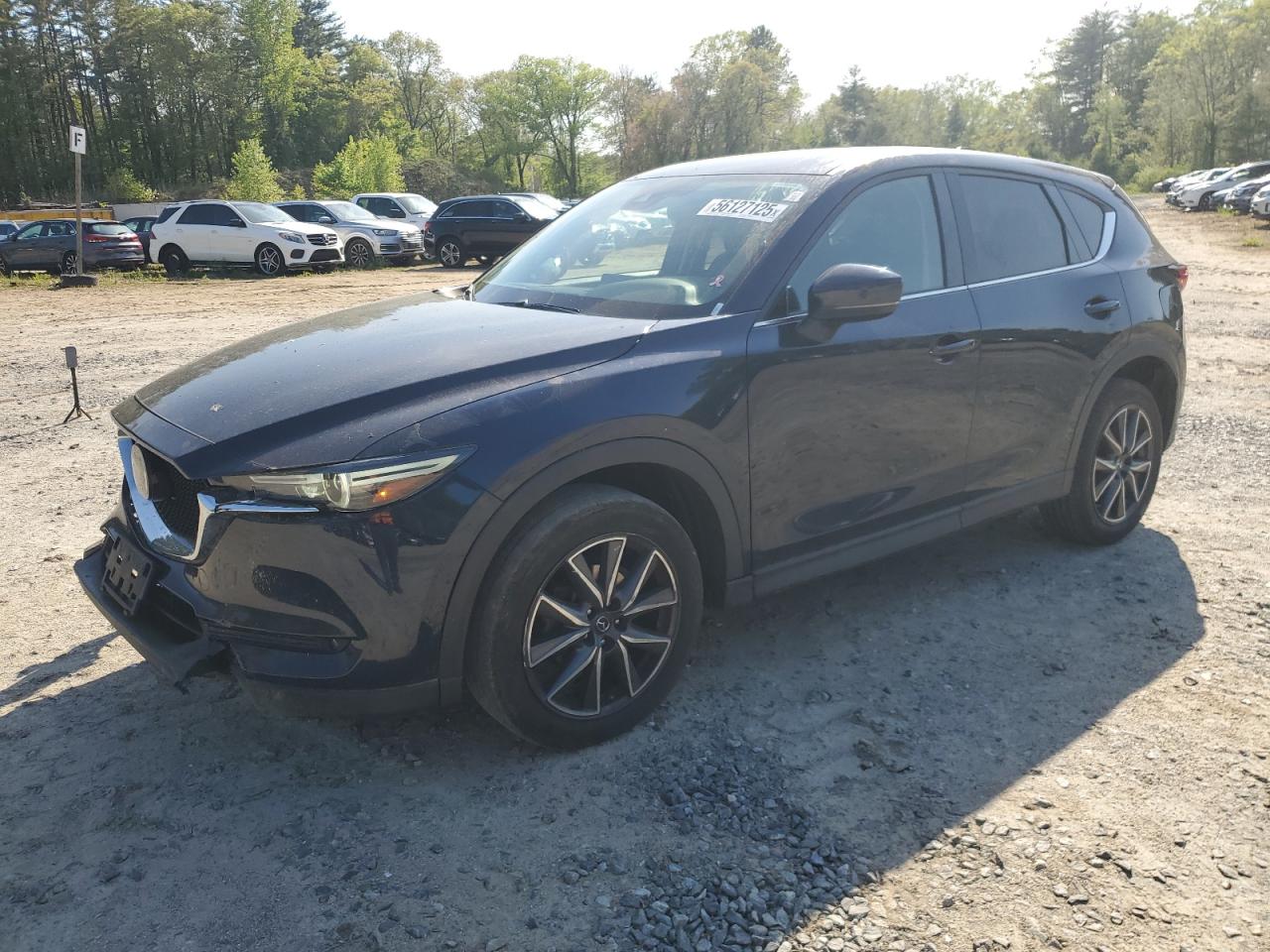 2017 Mazda CX-5 Grand Touring, VIN JM3KFBDLXH0217629 — Front end