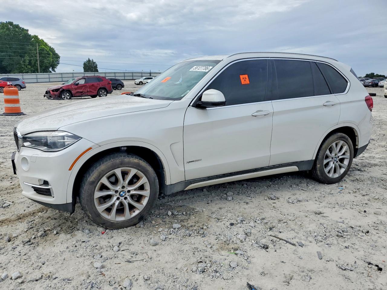 2015 BMW X5 xDrive35i, VIN 5UXKR0C54F0K65677 — Side