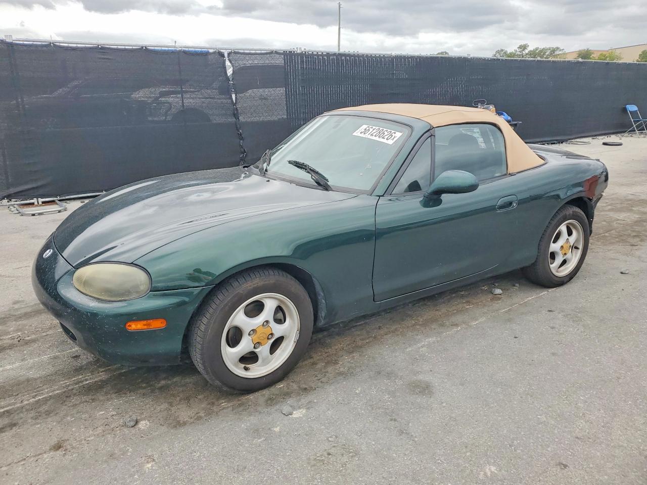 1999 Mazda MX-5 Miata, VIN JM1NB3537X0111174 — Rear end