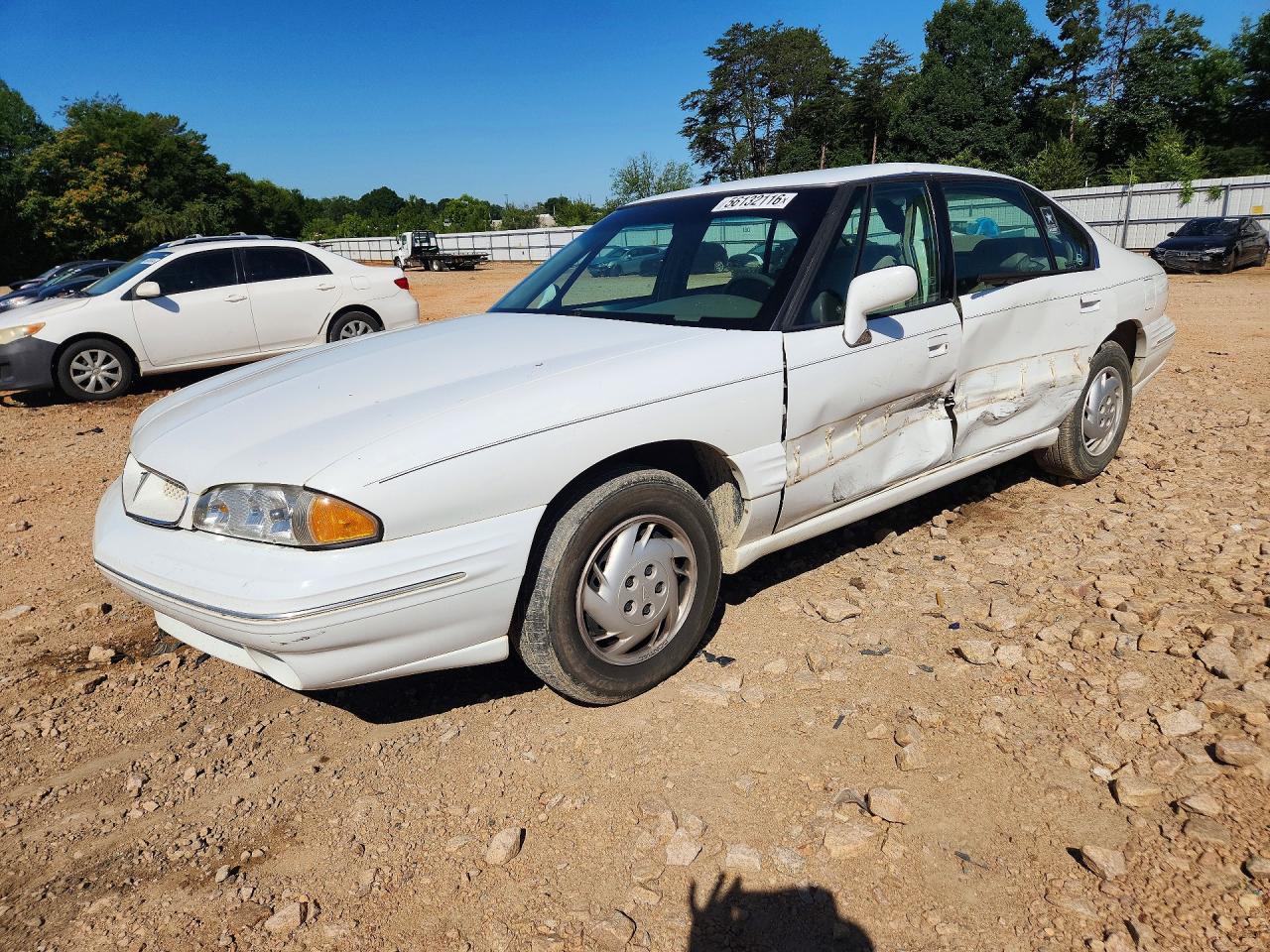 1998 Pontiac Bonneville SE, VIN 1G2HX52K1WH218683 — Side