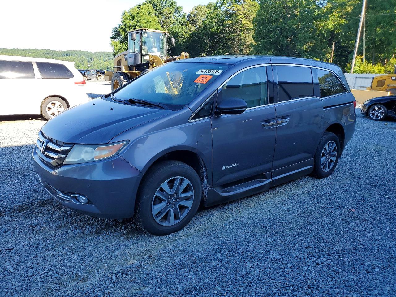 2015 Honda Odyssey Touring Elite, VIN 5FNRL5H93FB071444 — Prior damage history