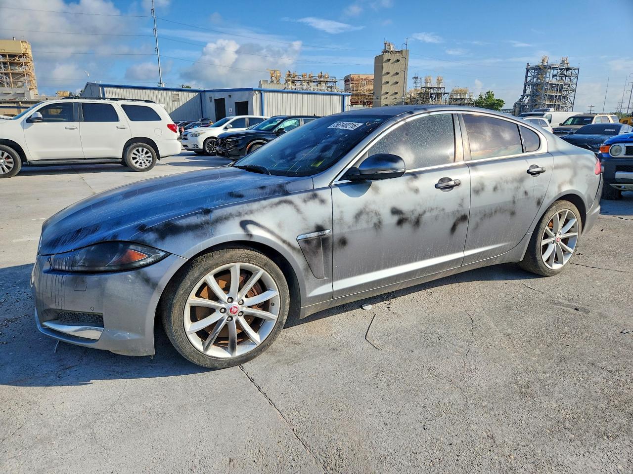 2015 Jaguar XF Portfolio, VIN SAJWA0F78F8U63155 — Vandalism