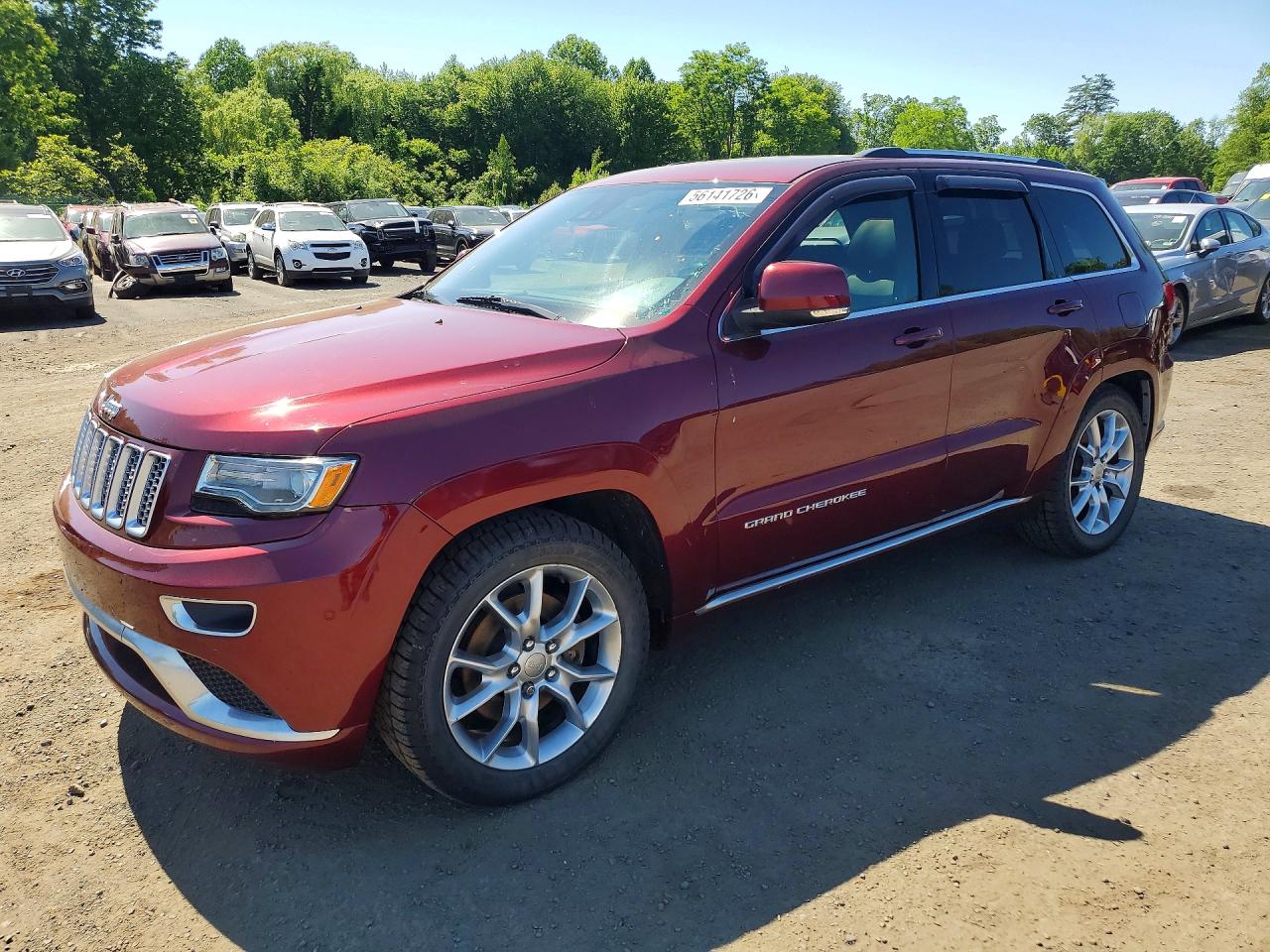 2016 Jeep Grand Cherokee Summit, VIN 1C4RJFJM4GC415422 — Minor dents and scratches