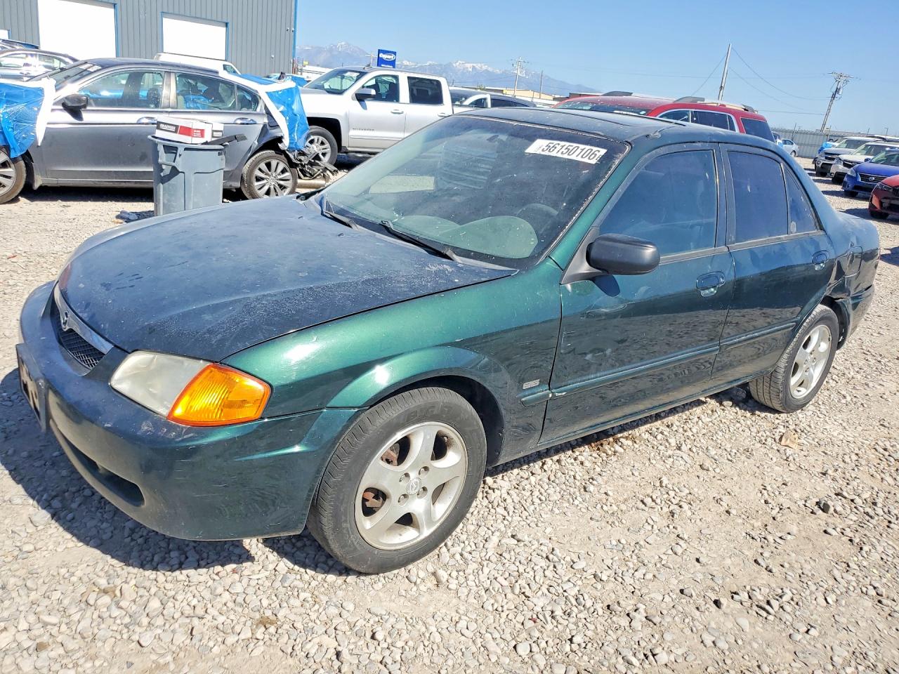 2000 Mazda Protege ES, VIN JM1BJ2211Y0266209 — Side