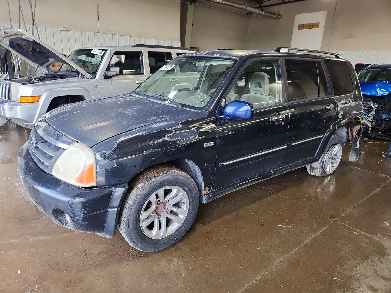 2004 Suzuki XL7 LX, VIN JS3TY92V544102655 — Зад