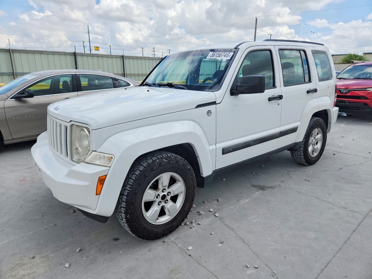 2012 Jeep Liberty Sport, VIN 1C4PJMAK6CW208825 — Град