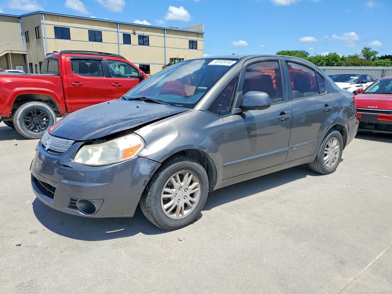 2012 Suzuki SX4 LE, VIN JS2YC5A33C6304060 — Front end