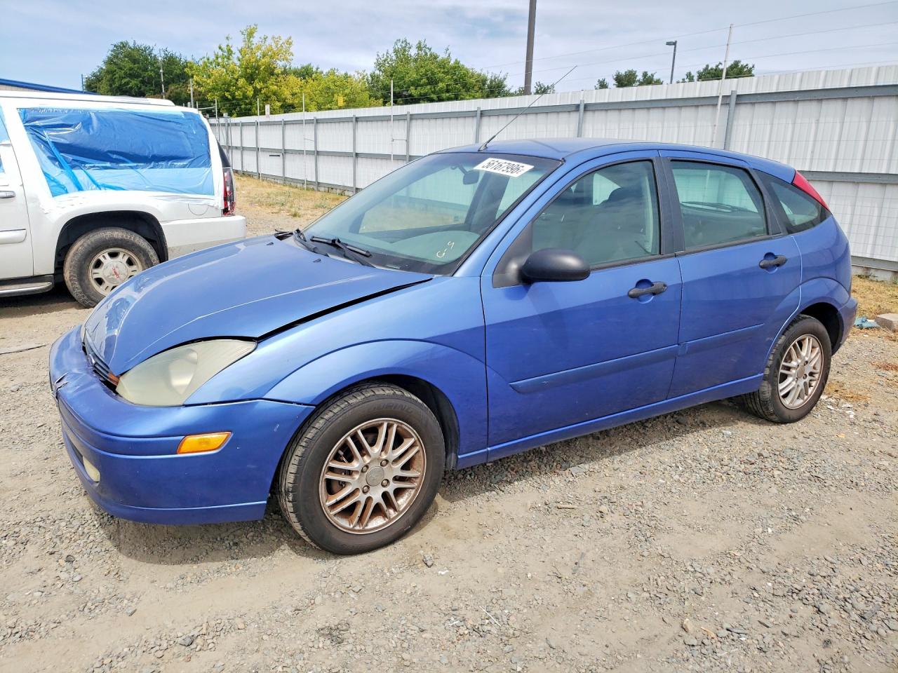2003 Ford Focus ZX5, VIN 3FAFP37Z43R141742 — Front end