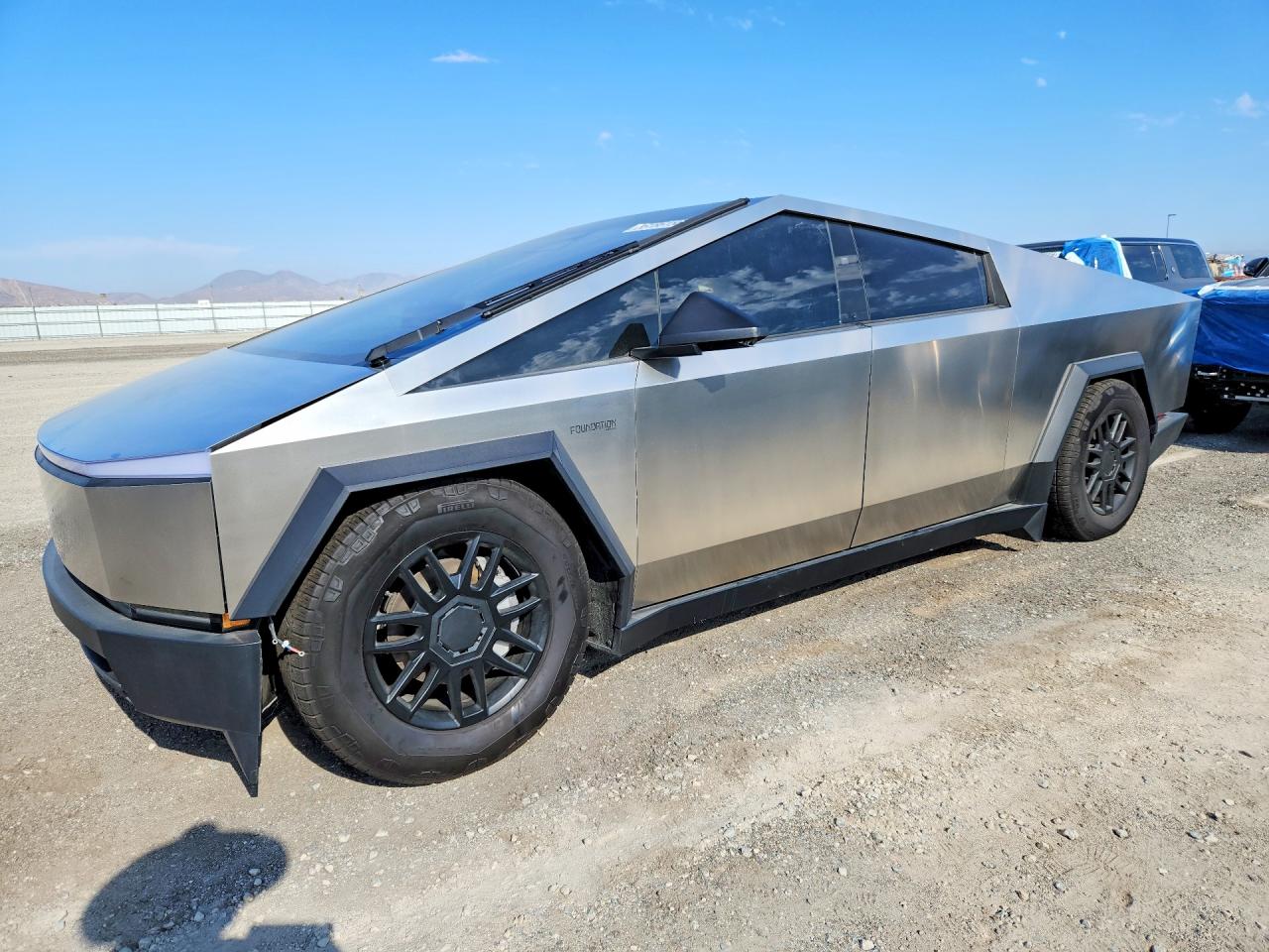 2024 Tesla Cybertruck, VIN 7G2CEHED7RA007061 — Side