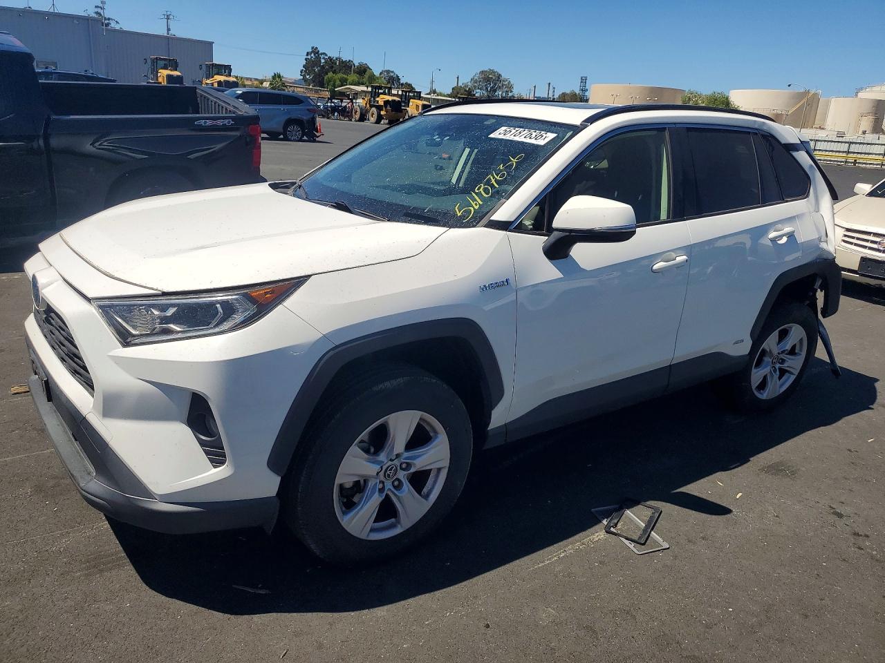 2019 Toyota RAV4 Hybrid XLE, VIN JTMRWRFV9KD009403 — Rear end