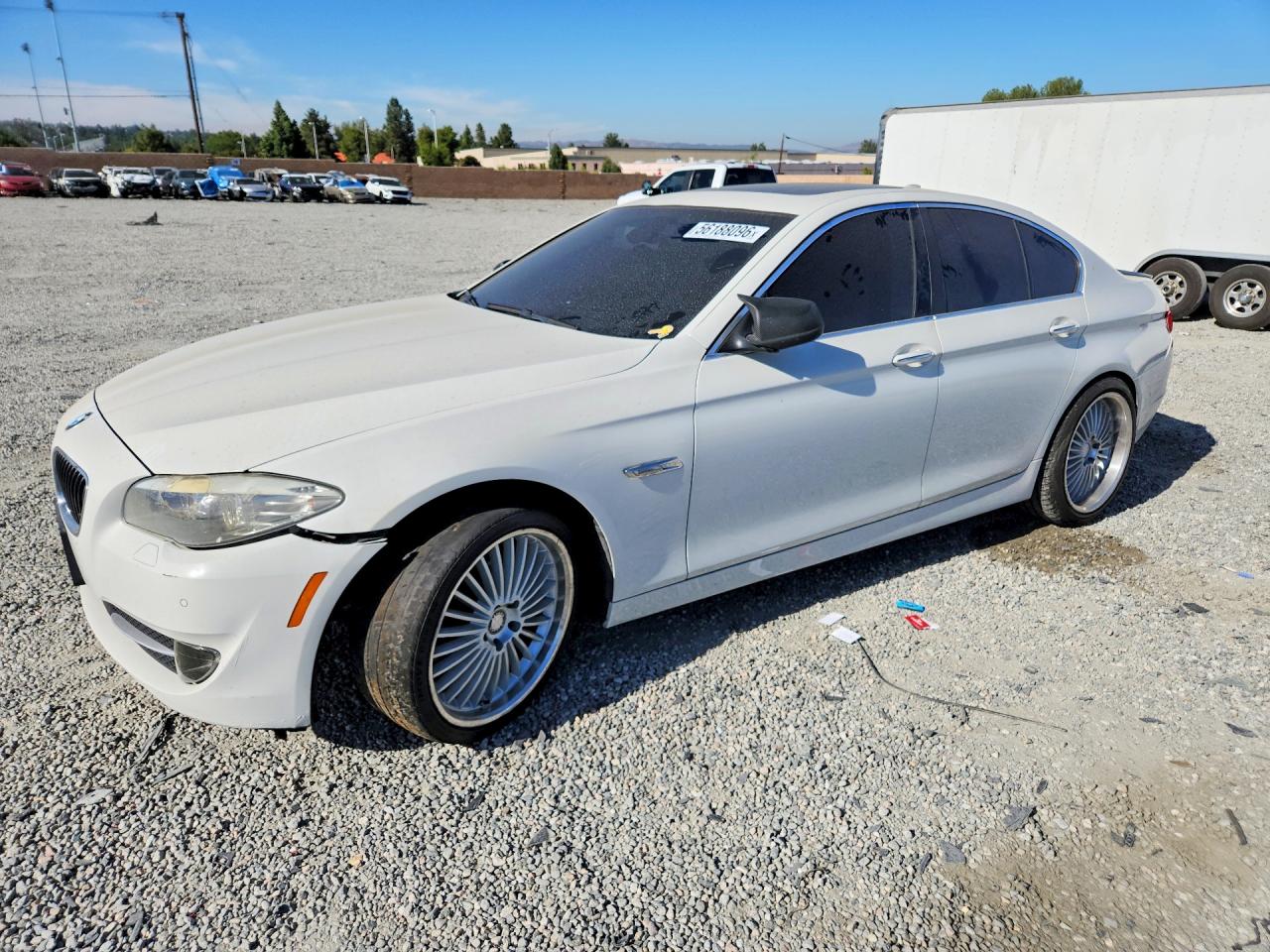 2011 BMW 5 Series 528i, VIN WBAFR1C54BC742655 — Side